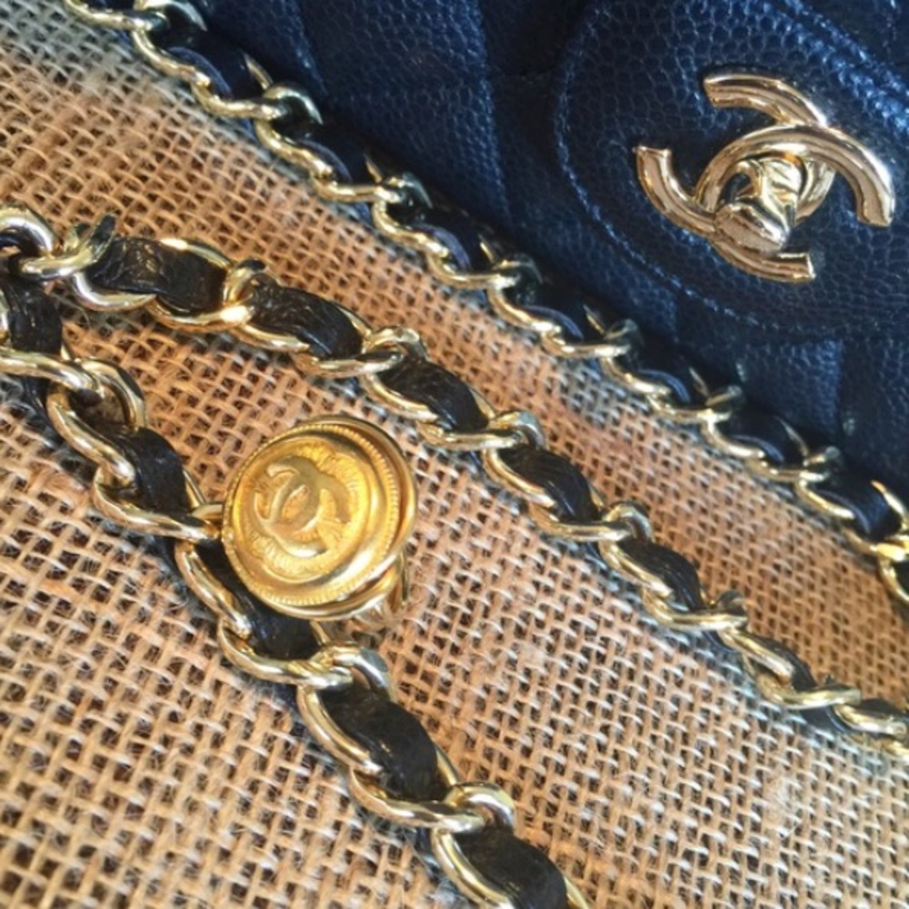 Authentic Chanel button ring.